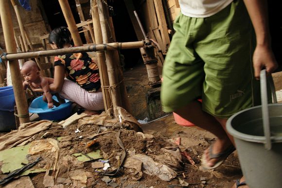 Access to clean water is very difficult. Many people use hand-pumps to get groundwater which may be less contaminated than the river ciliwung02.jpg